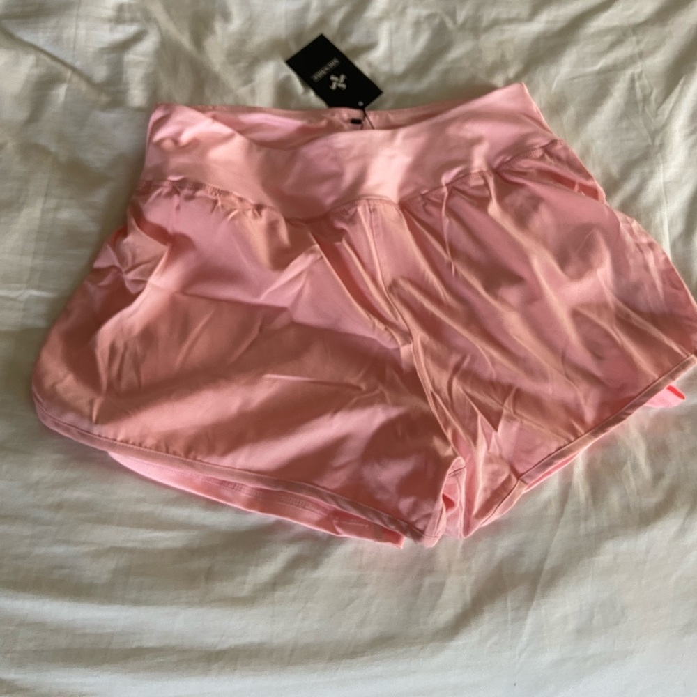 Pink running shorts